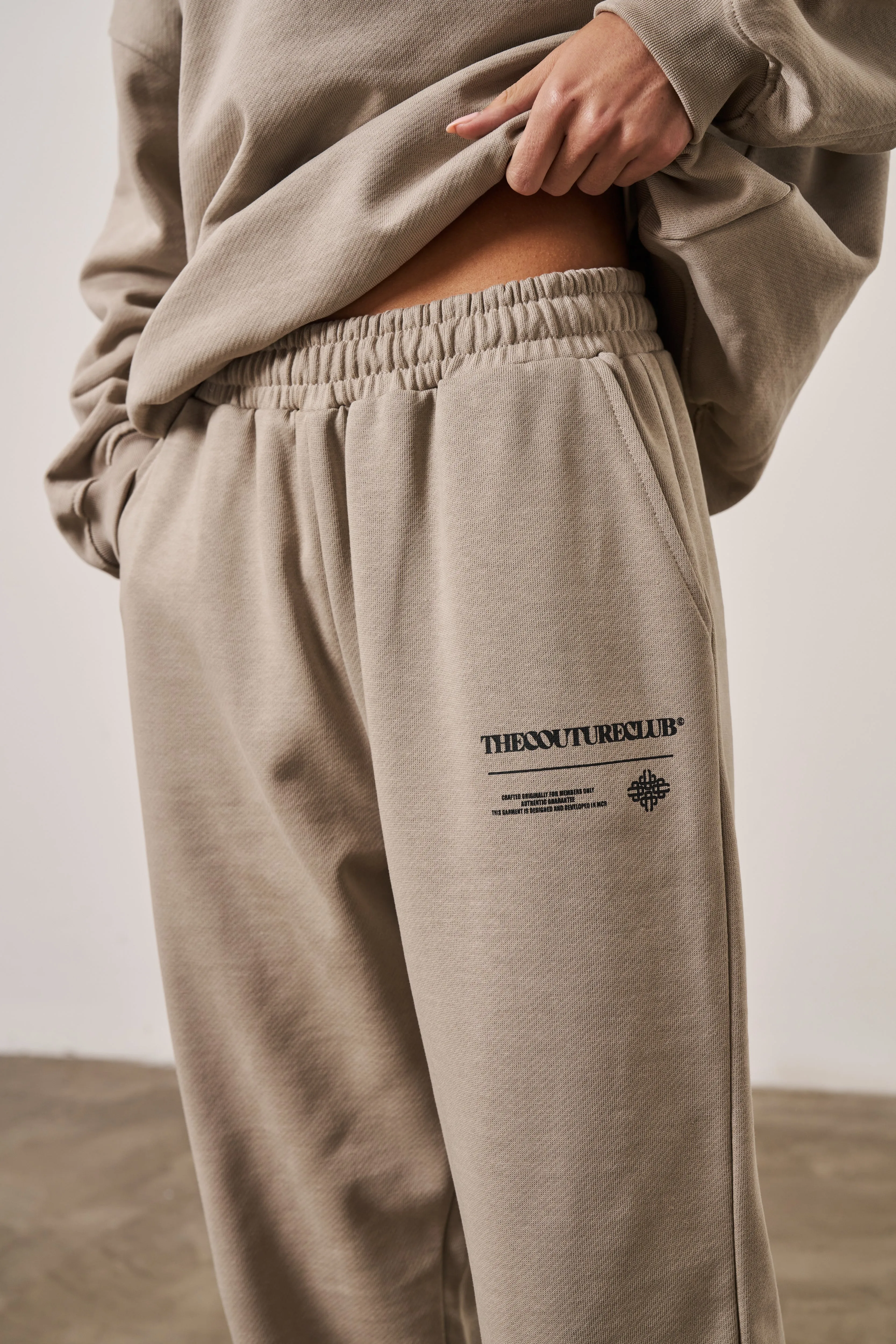 MULTI GRAPHIC RELAXED JOGGERS - BEIGE